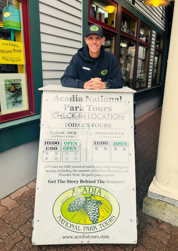 Andy Cough at the Acadia National Park Tours check-in kiosk on Main Street, Bar Harbor