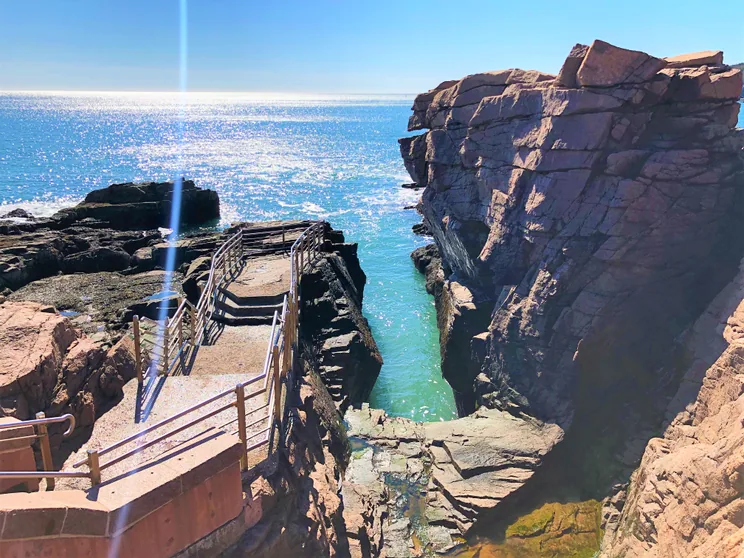 The narrow granite chasm at Thunder Hole on Acadia's Ocean Drive